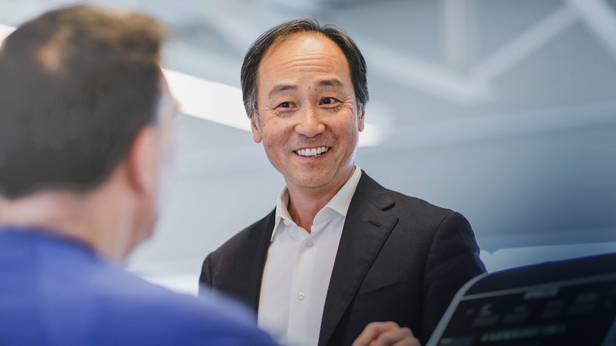 Dr. Paul Oh speaks to a colleague about pre-surgery workouts.